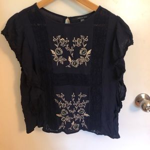 Embroidered navy blouse